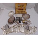 A quantity of silver plate to include a salver, flatware, condiments and an entr‚e dish and cover