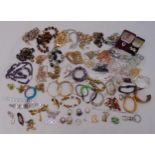 A quantity of silver and costume jewellery to include necklaces, rings, earrings, bracelets and