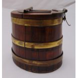 A 19th century tobacco canister in the form of a brass banded barrel with hinged cover, 16 x 17.5