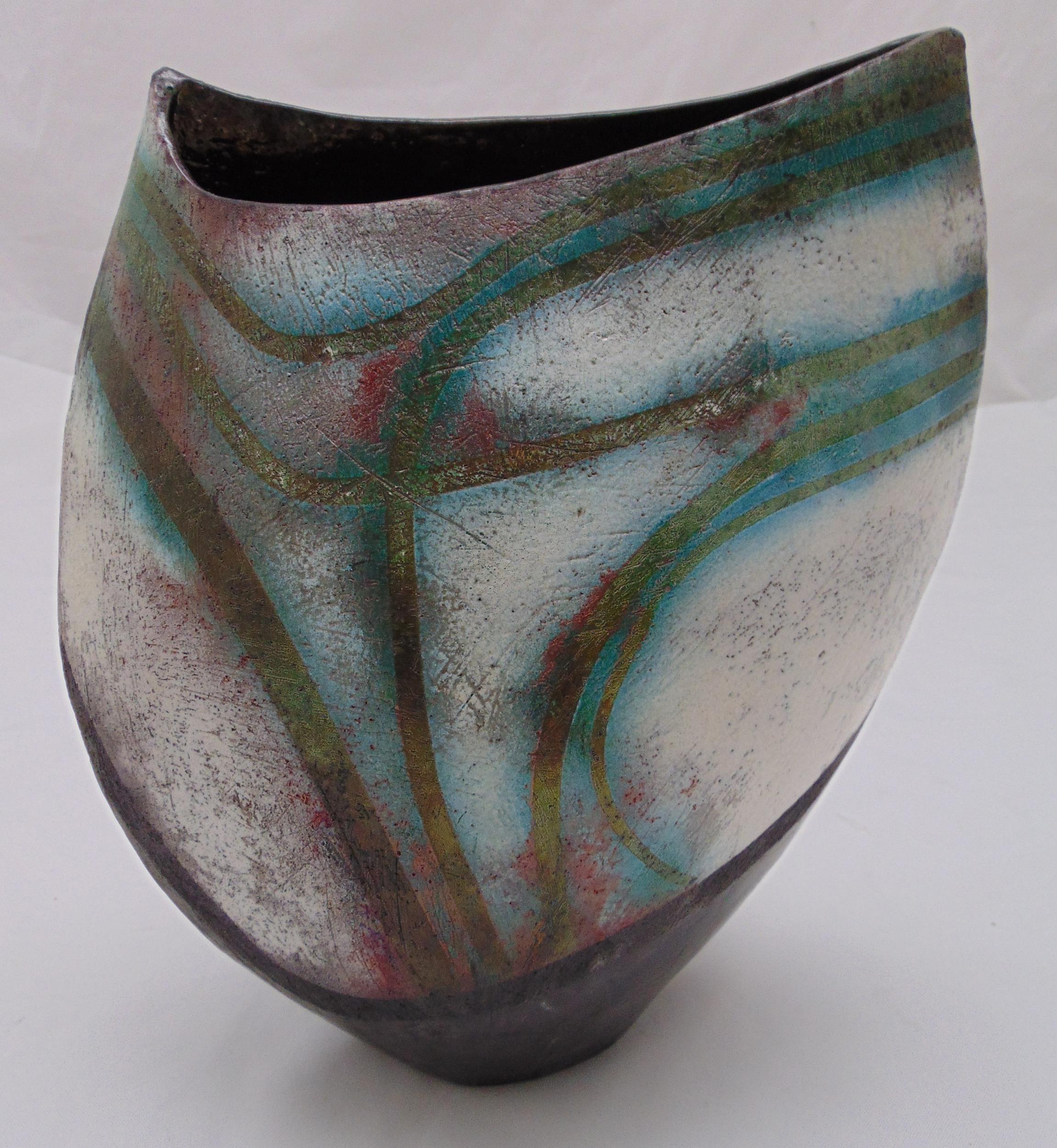 David Howard Jones ceramic Raku vase of oval section and polychromatic geometric decoration,