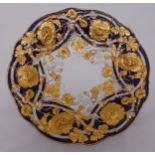 A 19th century Meissen bowl decorated with cobalt blue and gilded floral decoration, marks to the