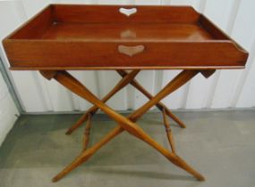 A rectangular mahogany butlers tray on scissor action stand, 81 x 76 x 49.5cm, A/F