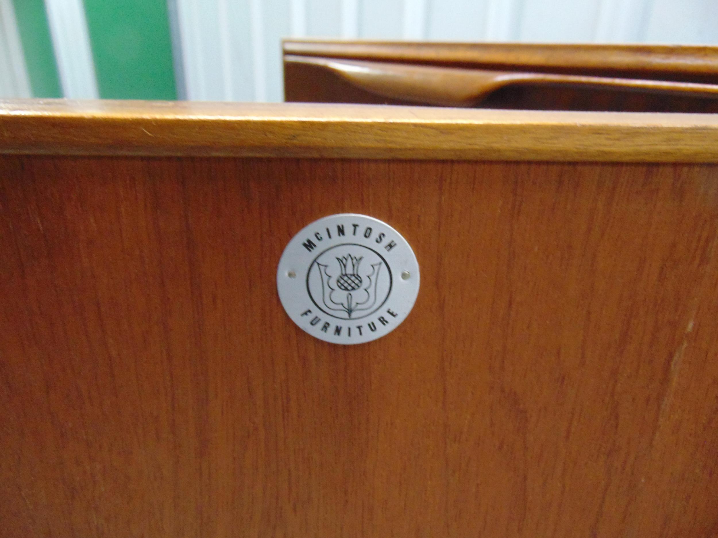 A mid 20th century McIntosh rectangular teak sideboard with cupboards and three drawers on - Image 4 of 4