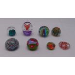 Eight glass paperweights to include Millefiori and Caithness