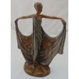 An Art Deco style figurine of a lady with a shaped pattern dress, 39cm (h)