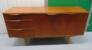 A mid 20th century McIntosh rectangular teak sideboard with cupboards and three drawers on
