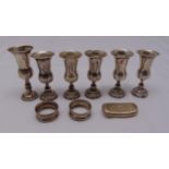 A quantity of hallmarked silver to include a snuff box, six Kiddush cups and two napkin rings,