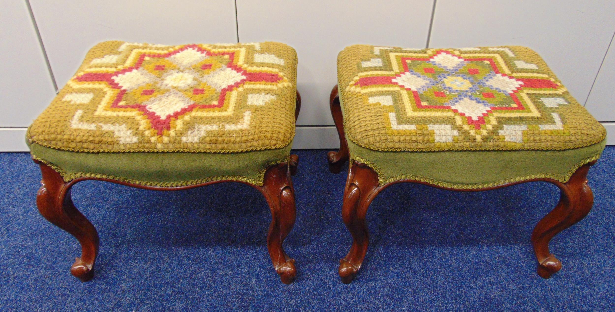 A pair of mahogany upholstered foot stools on cabriole legs, 40 x 50 x 44cm