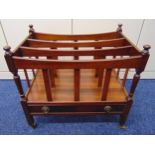 A mahogany Canterbury of customary form with one drawer on four castors, 52.5 x 55.5 x 35cm