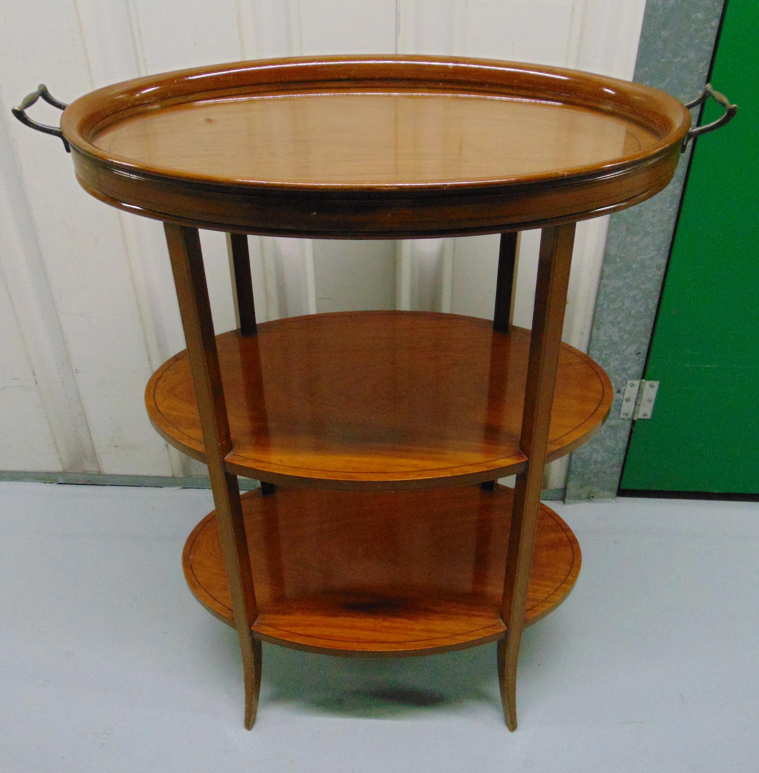 An Edwardian oval tray table on four tapering supports, 80 x 65 x 36cm