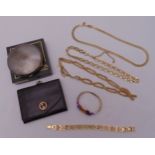 A quantity of costume jewellery to include necklaces, a Gucci leather purse, a white metal and