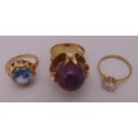 Three 9ct gold rings set with coloured stones, approx total weight 16.9g