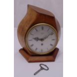 WWII Smith mantle clock mounted in a propeller with details to the side, to include key, 28cm (h)