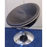 A 1960s style conical revolving chair on raised circular base