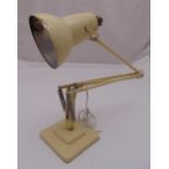 A mid 20th century cream angle poise table lamp on stepped square base A/F