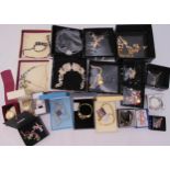 A quantity of silver and costume jewellery to include necklaces, earrings, bracelets, brooches and
