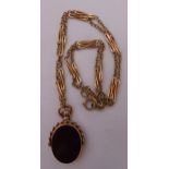 9ct gold fob chain with green and red agate spinning fob mounted in 9ct gold frame, approx total
