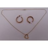 A pair of 9ct gold hoop earrings and a 9ct chain with 9ct gold heart shaped pendant, approx total