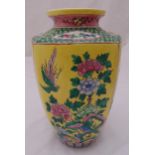 An early 20th century Chinese vase of tapering panelled form decorated with birds and flowers, marks
