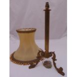 A gilt metal table lamp on triform base to include silk shade, 55.5cm (h)