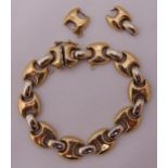 9ct yellow gold fancy link bracelet to include two spare links, approx total weight 12.4g