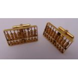 A pair of 14ct yellow gold cufflinks in the form of abacuses, approx total weight 10.8g