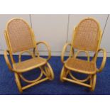 A pair of bamboo childrens rocking chairs with bergere seats and backs