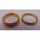 Two 22ct gold wedding bands, approx total weight 9.7g