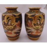 A pair of Satsuma baluster vases decorated with warriors and dragons, 19cm (h)
