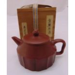 A Chinese Yixing teapot, character marks to the base to include presentation wooden case