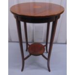 An Edwardian mahogany inlaid circular occasional table on four outswept legs, 70 x 44cm