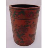 A Chinese cinnabar lacquer cylindrical brush pot decorated with birds, flowers and Chinese