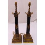 A pair of gilt metal and bronzed table lamps, cluster column stems, leaf chased capitals, the raised