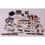 A quantity of costume jewellery to include necklaces, earrings, brooches and wristwatches