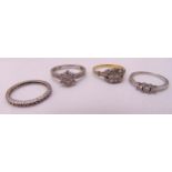 Four 9ct gold and diamond rings, approx total weight 7.6g