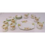 Royal Albert early 20th century teaset to include plates, cups, saucers, a cake plate, milk jug