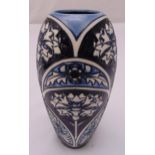 Moorcroft ovoid vase decorated with flowers and leaves, designed by Sian Leeper, marks to the