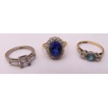 Three 9ct gold rings set with coloured stones, approx total weight 8.7g