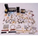 A quantity of costume jewellery to include necklaces, bracelets, earrings, brooches, rings, pendants