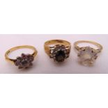 Three 9ct gold rings set with coloured stones, approx total weight 7.1g