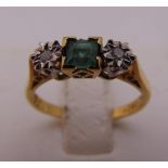 18ct yellow gold ring set with emeralds and diamonds, approx total weight 2.9g