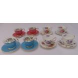 Eight Aynsley teacups and saucers decorated with flowers and leaves (16)