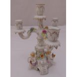 Schierholz porcelain four light candelabrum on triform base decorated with putti and applied