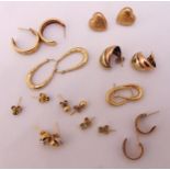 Ten pairs of 9ct gold earrings of various shape and style, approx total weight 9.7g