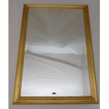 A gilded framed rectangular bevel edge wall mirror, 72 x 102.5cm
