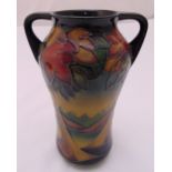 Moorcroft two handled baluster vase decorated with flowers, leaves and landscapes, limited edition