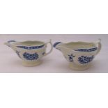 A pair of Worcester first period blue and white oval sauce boats with scroll handles on raised