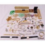A quantity of costume jewellery to include necklaces, bracelets, earrings, brooches, rings, pendants