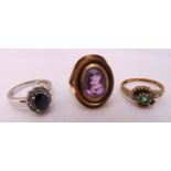 Three 9ct gold rings set with coloured stones, approx total weight 9.4g