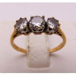 18ct yellow gold three stone diamond ring, approx total weight 1.4g